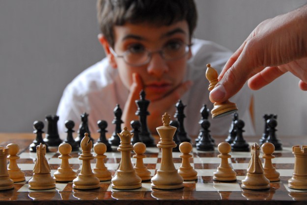 Kid playing chess