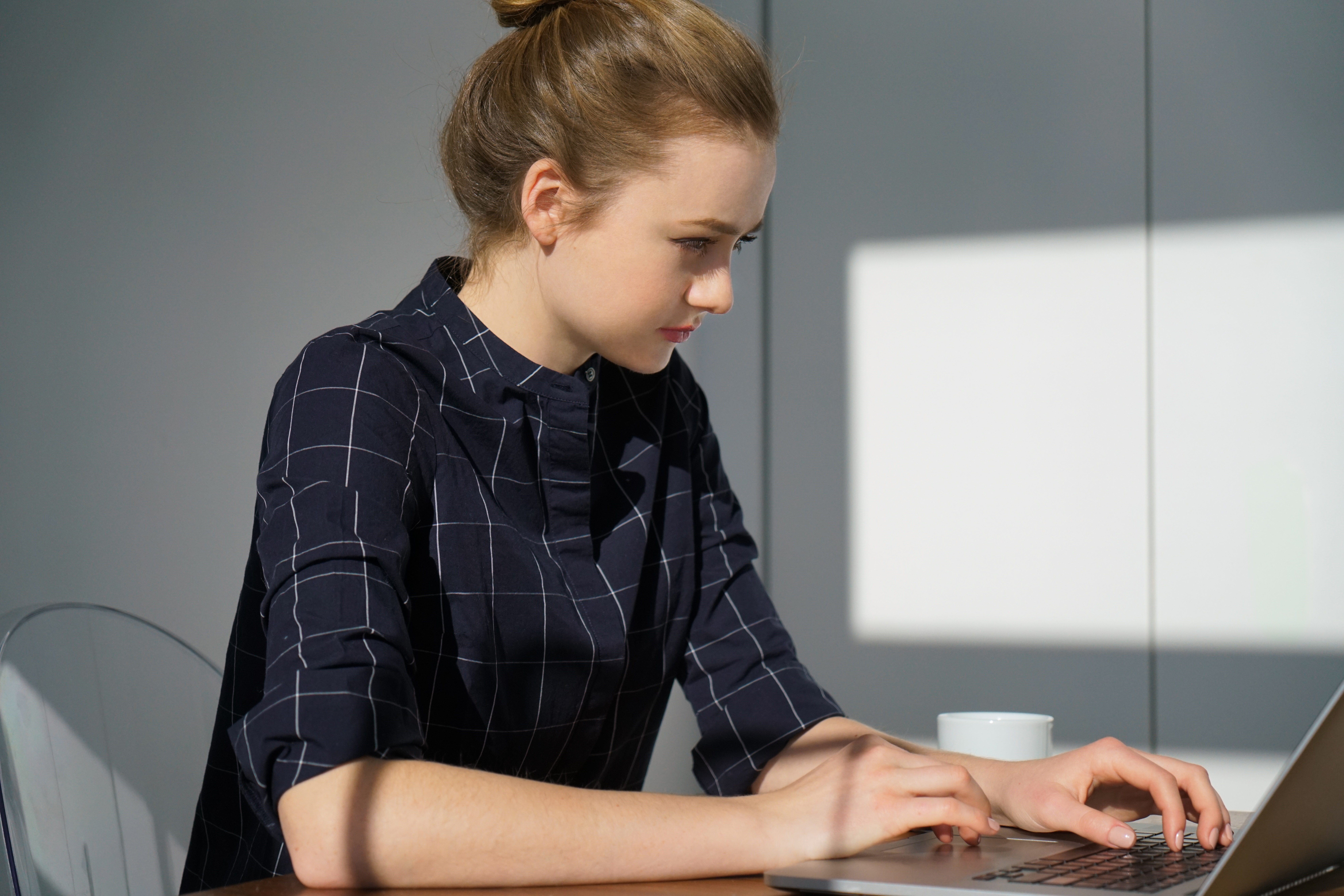 Businesswoman working on laptop computer